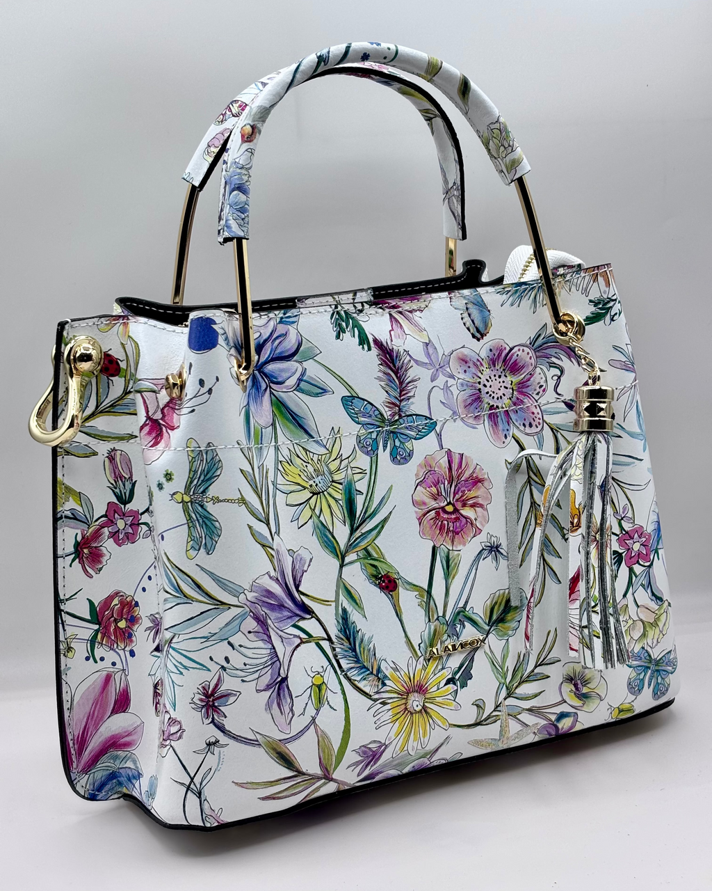 Borsa PAULETTE SPRING da donna in vera pelle martellata made in italy, colore bianco floreale, firmata Alaincox, negozio di Genova, con pochette interna con zip, tracolla regolabile e dettagli in acciaio dorato, elegante e capiente per uso quotidiano.