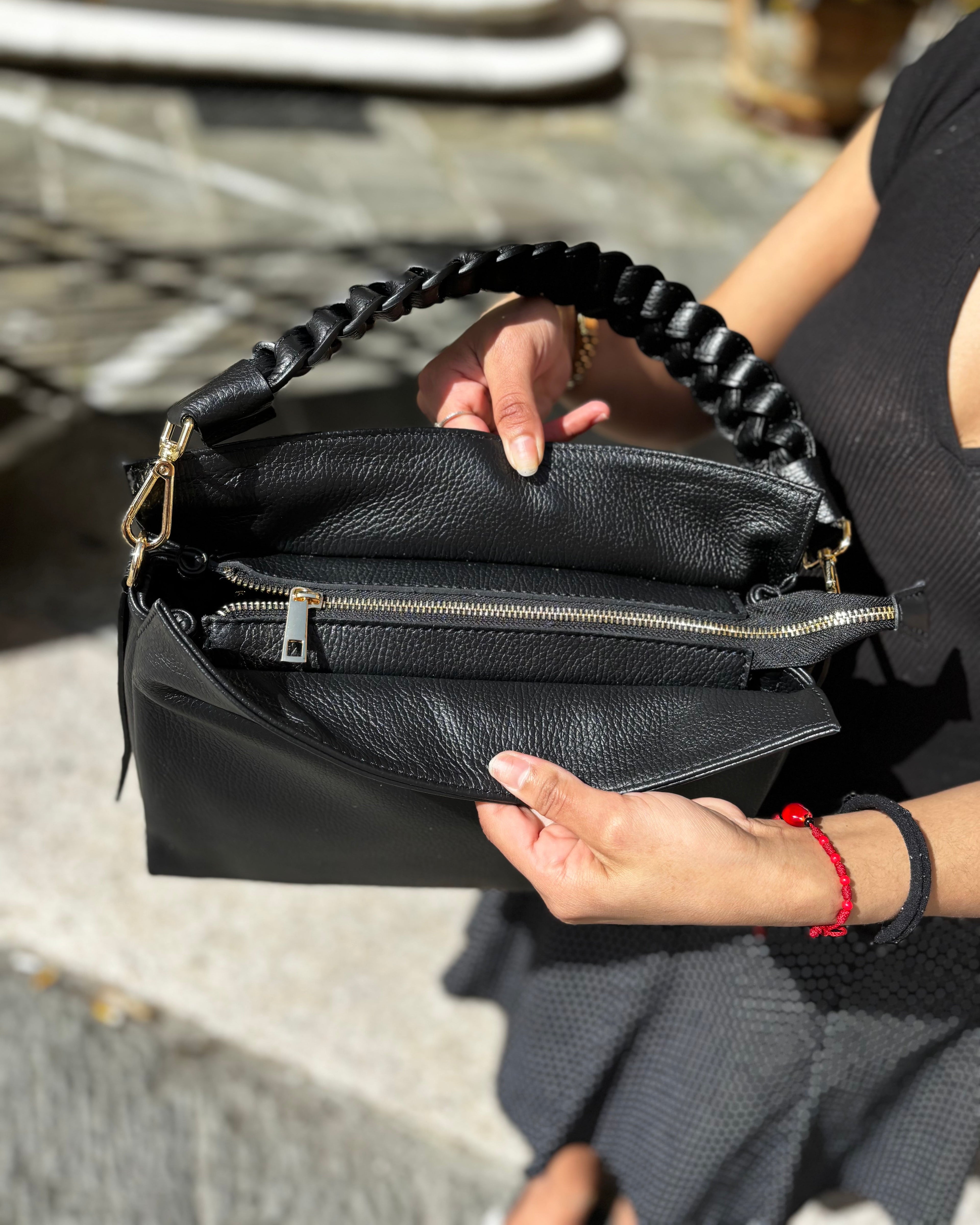 Borsa TRECCIA ALAINCOX Genova in vera pelle martellata Made in Italy, con manico intrecciato removibile, tracolla regolabile, chiusura zip e dimensioni 31x25x11 cm. Nero